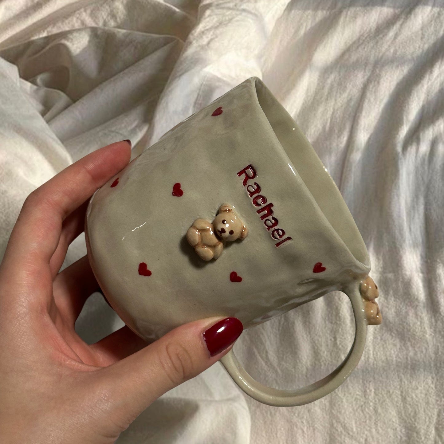 Handmade teddy mug with red hearts