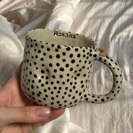 Handmade chunky dotted mug with croissant